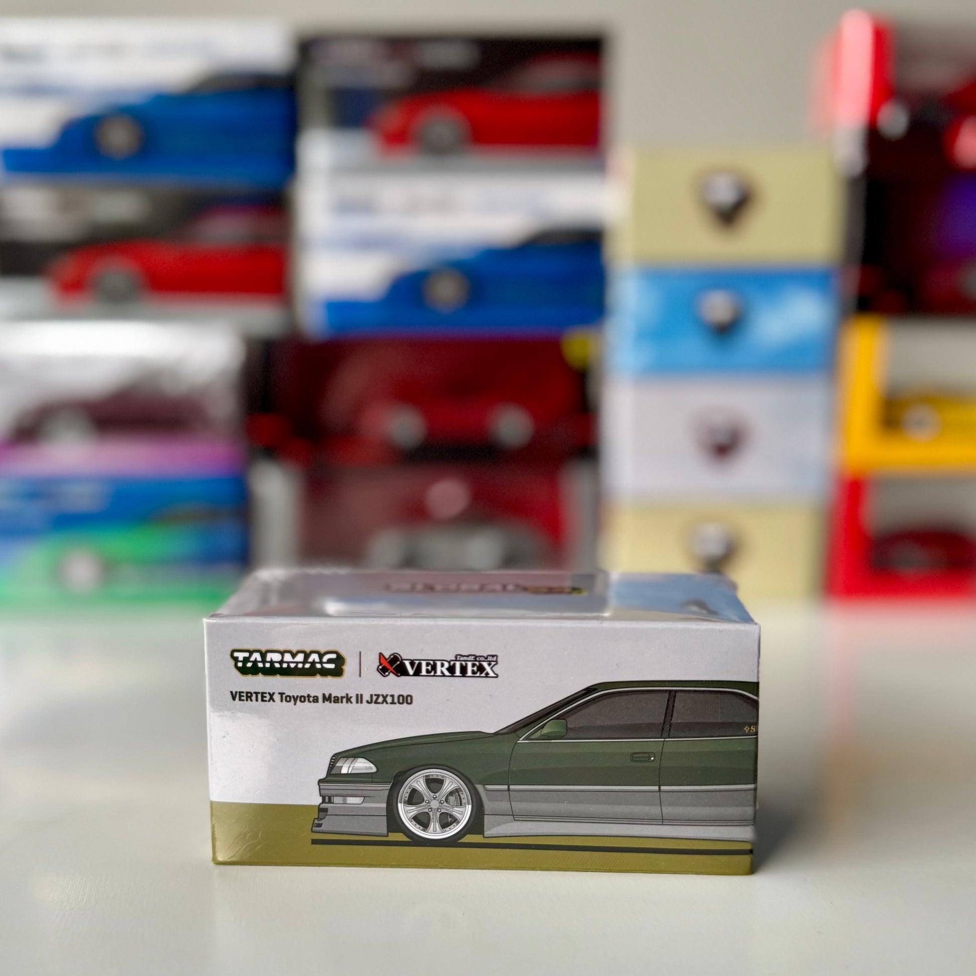 Packaging of Global64 Toyota Mark II JZX100 Vertex in Dark Green Metallic