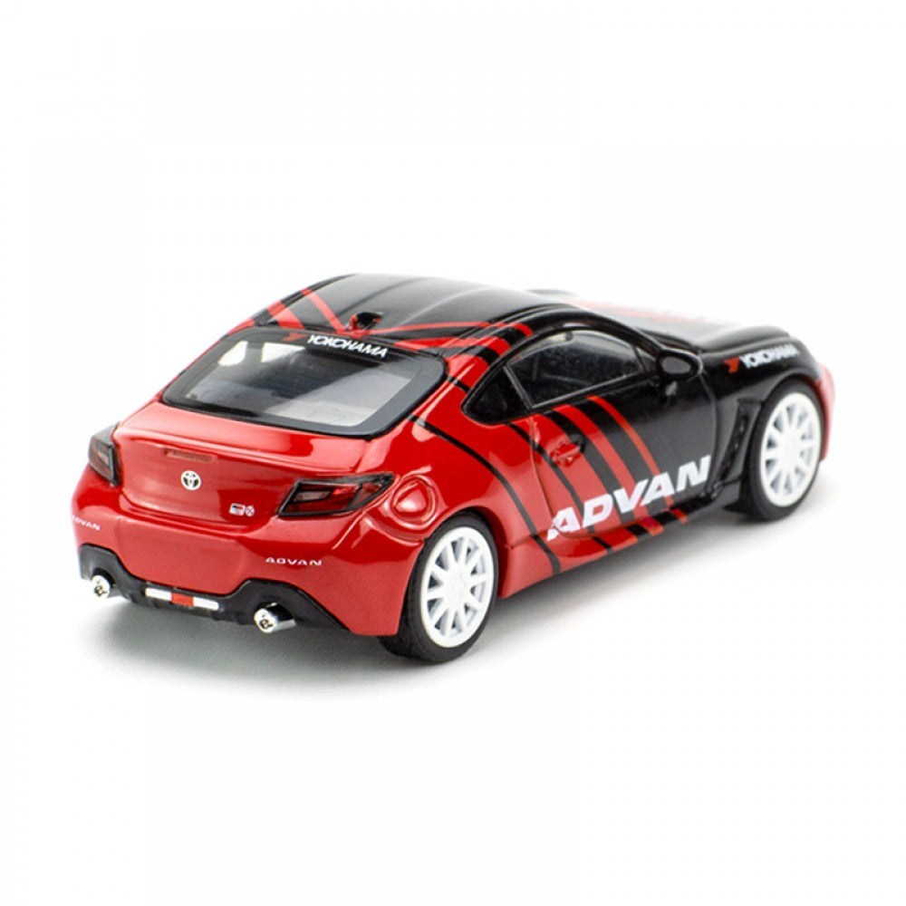 Rear view of Toyota GR86 Advan 1:64 model, out of box