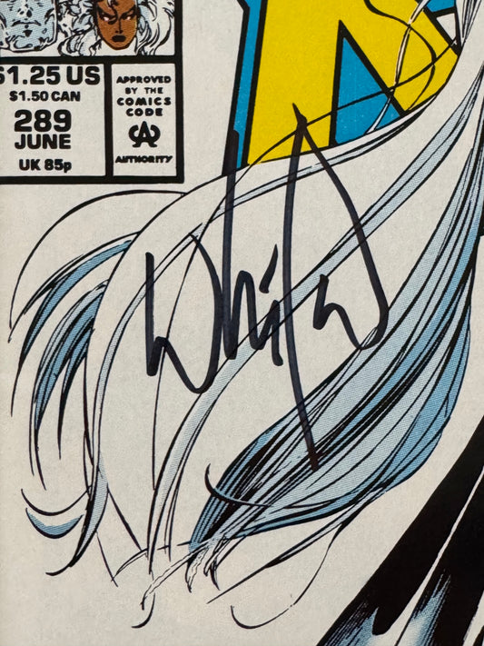 Close-up of Whilce Portacio's autograph on The Uncanny X-Men #289 comic book