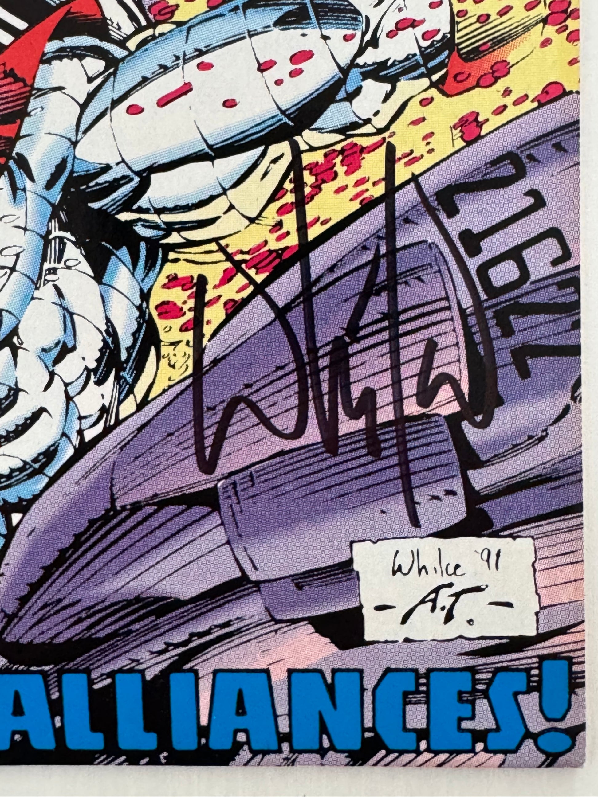 Close-up of Whilce Portacio’s autograph on The Uncanny X-Men Issue #281 (1991) comic book.