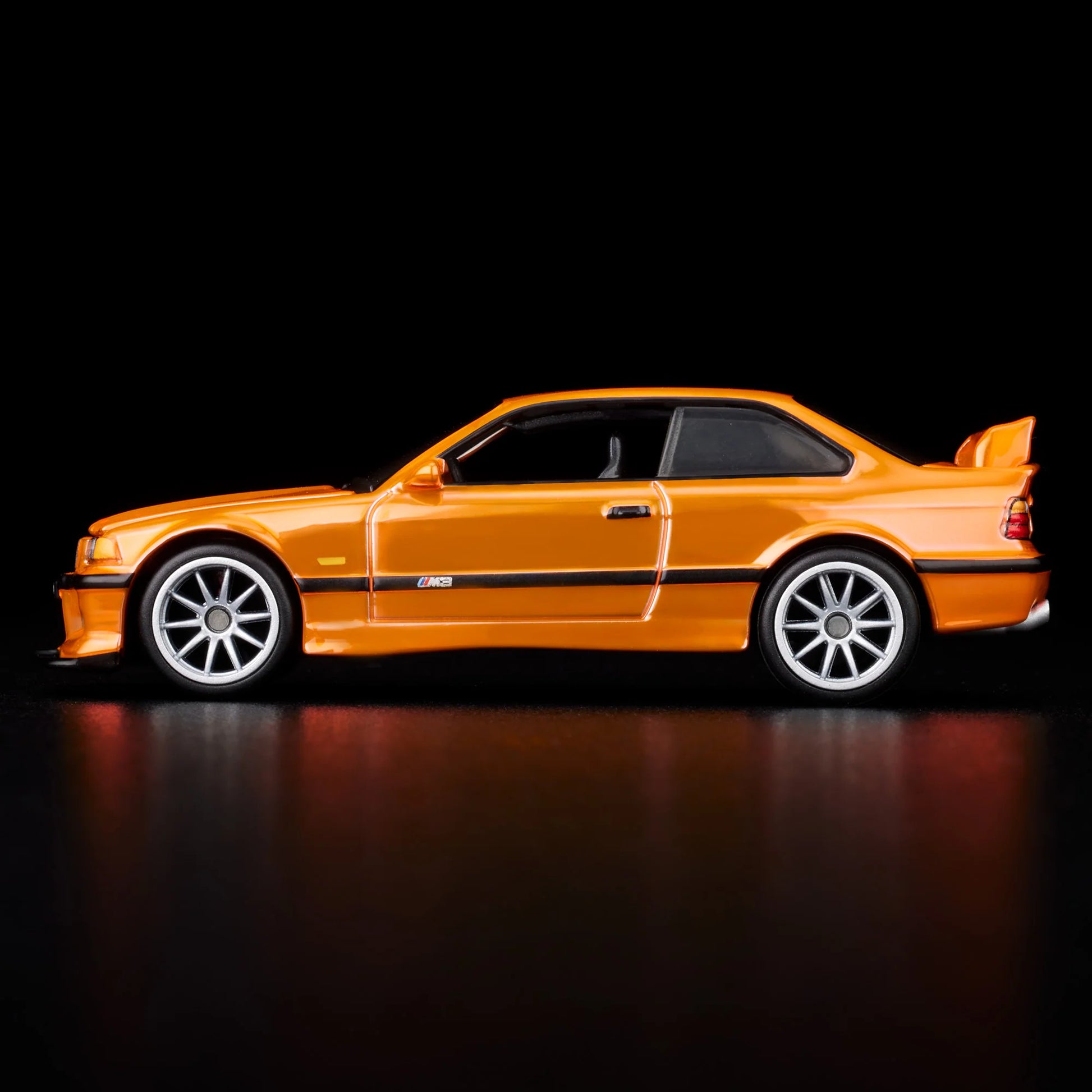 Side profile of Hot Wheels Collectors 1:64 BMW M3 LTW in orange