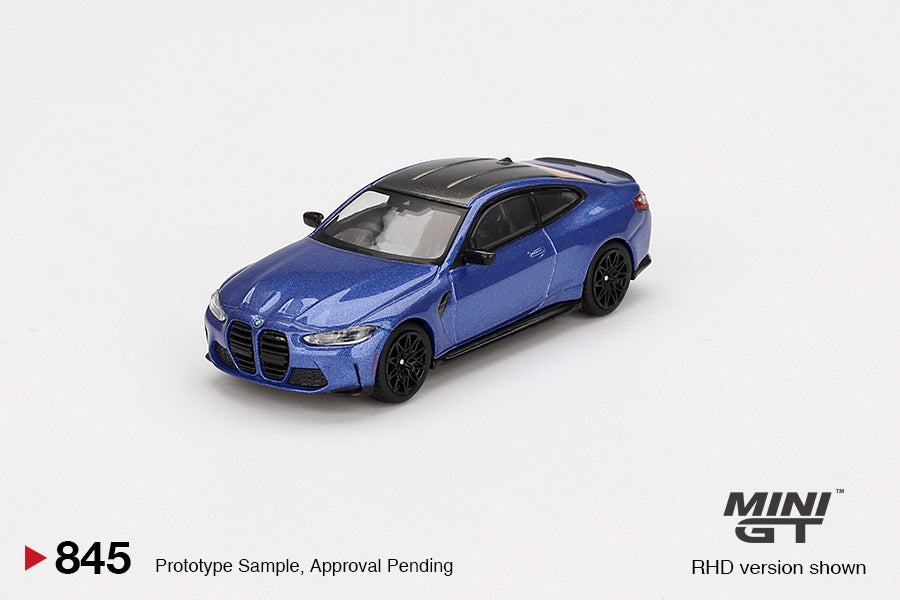 Front view of BMW M4 Competition Portimao Blue RHD 1:64 diecast by Mini GT
