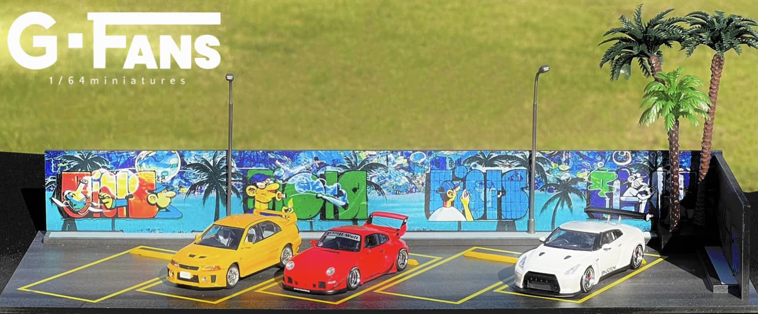 Graffiti wall art detail on urban-style 1:64 scale diorama