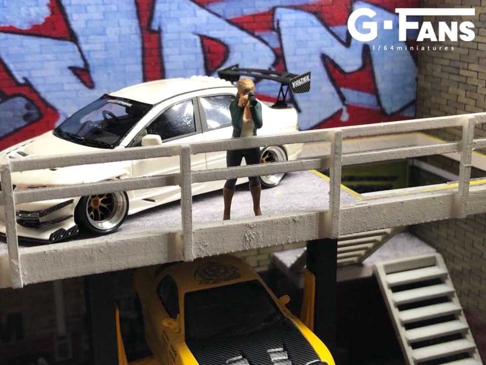 Close-up of ramp connecting levels in JDM double storey garage diorama