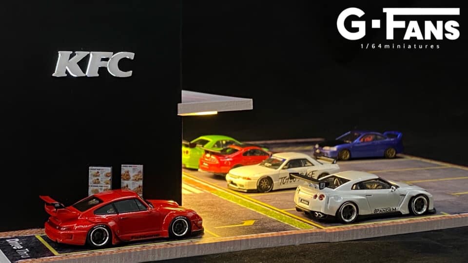 Side view showing drive-thru and LED-lit details of KFC diorama with cars (not included)