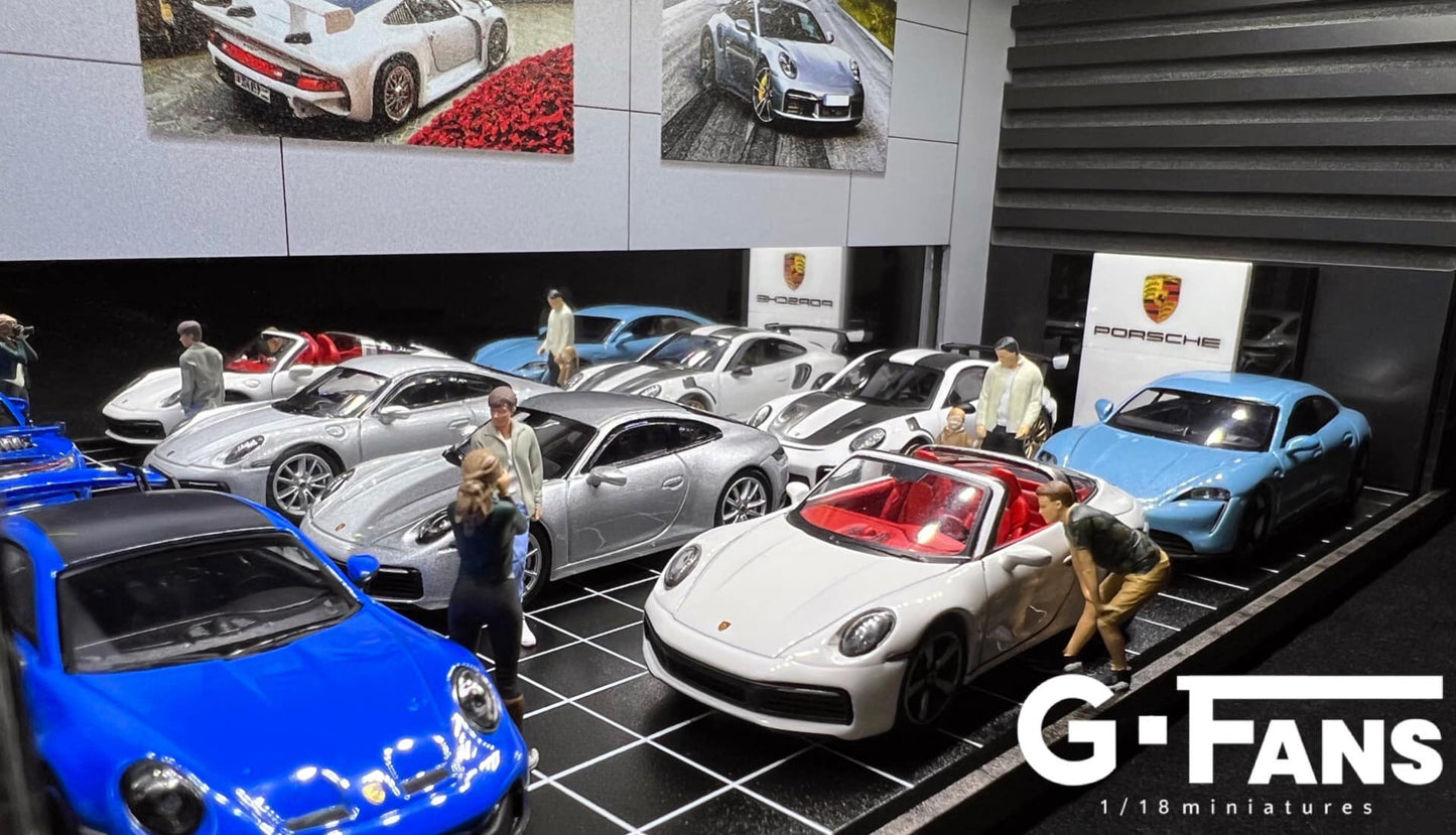 Diecast cars displayed in 1:64 scale Porsche service diorama (cars not included)