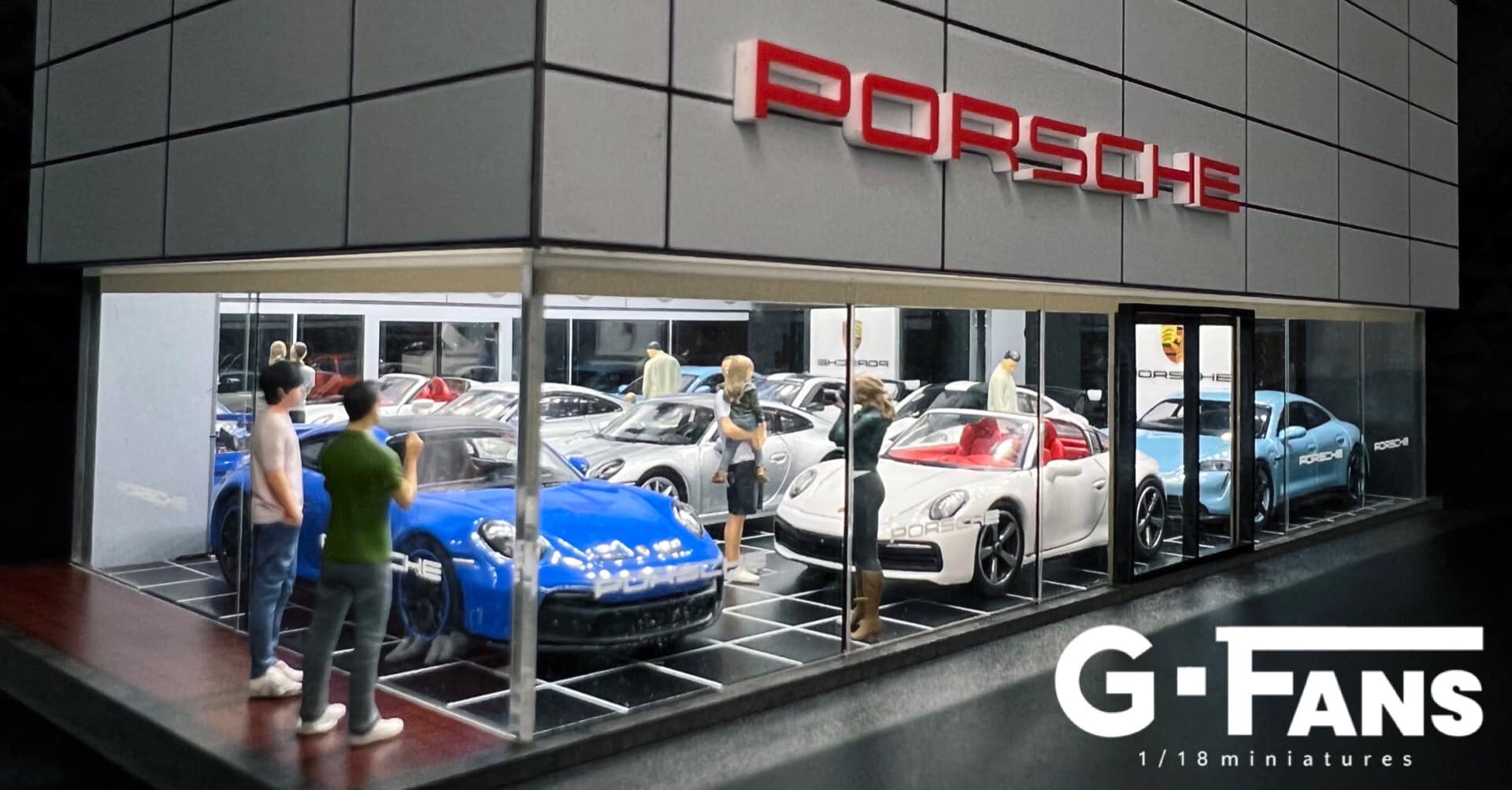 Diecast cars displayed in 1:64 scale Porsche service diorama (cars not included)