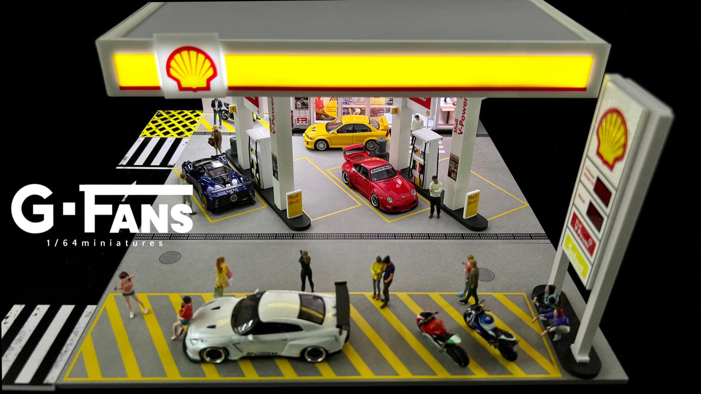 Top-down view of Shell Gas Station Diorama with fuel pumps