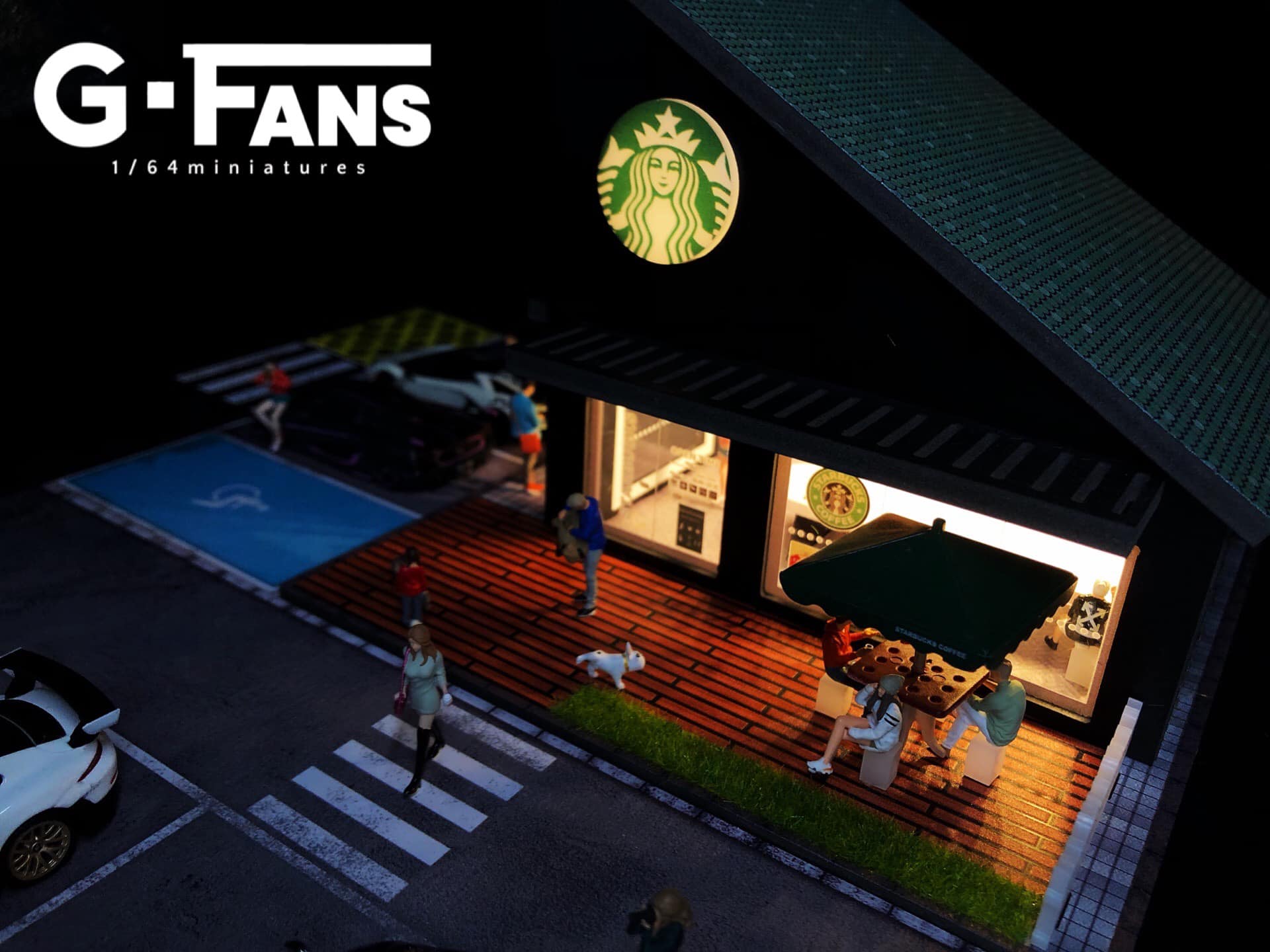 Top-down view of Starbucks miniature diorama with parking lot layout