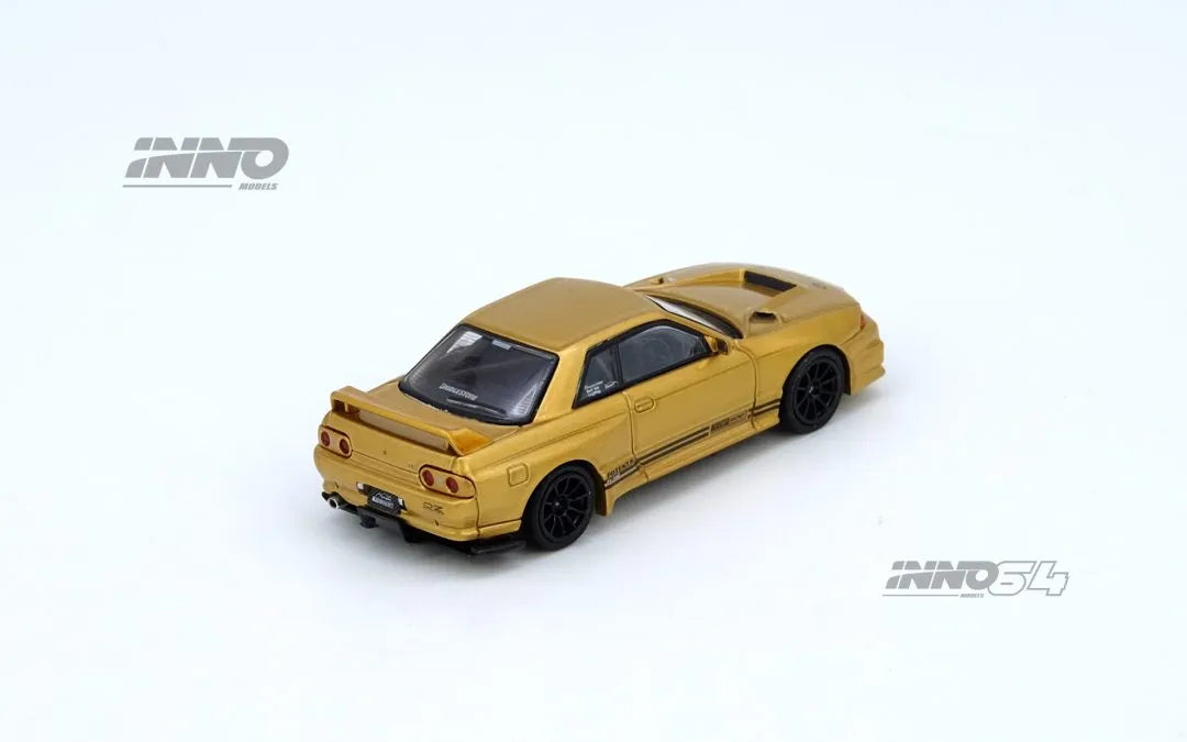 Nissan BNR32 GT-R Top Secret 650R Gold rear angle Inno64 diecast model
