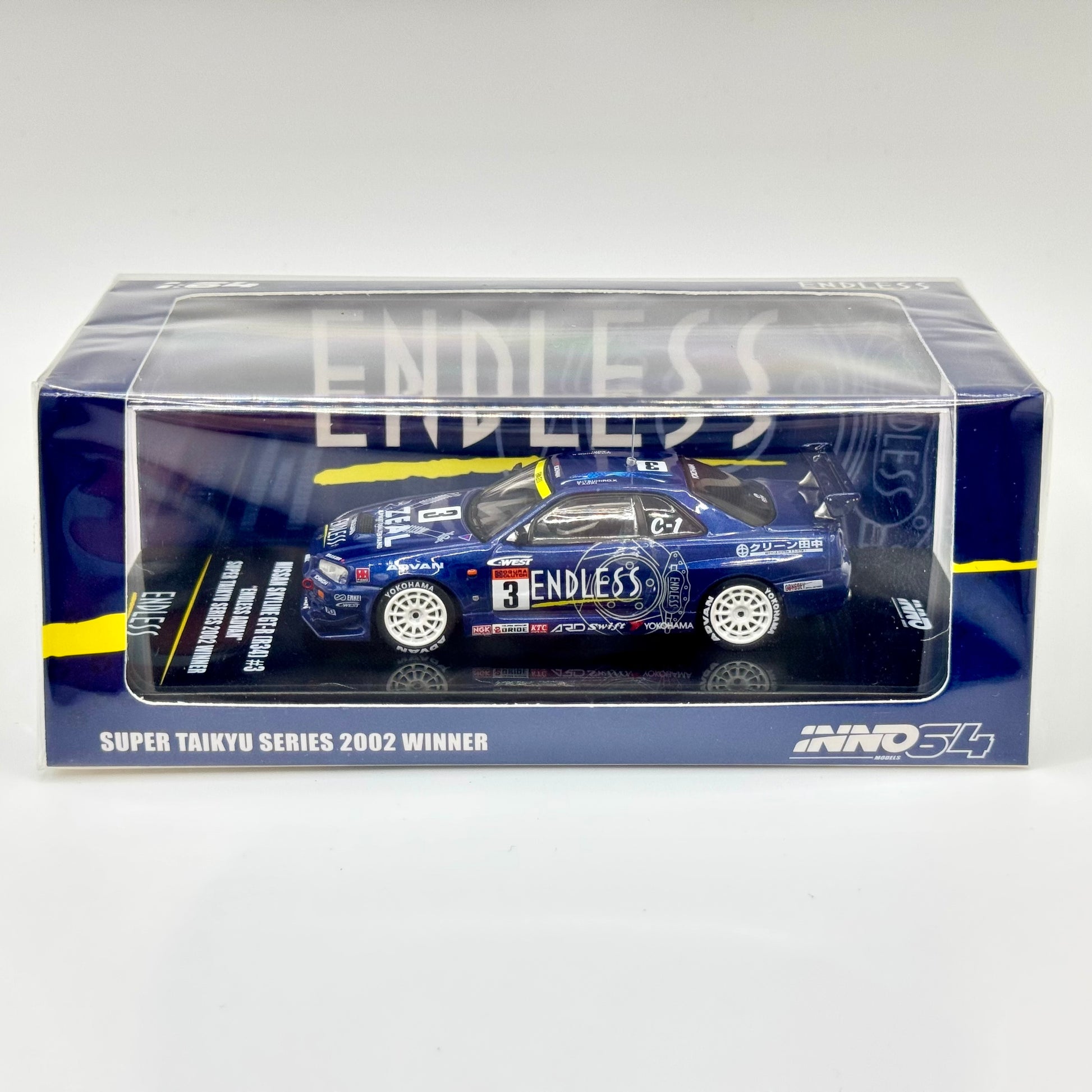 Inno64 Nissan Skyline GT-R R34 #3 ENDLESS ADVAN Super Taikyu 2002 Winner 1:64 diecast model boxed front view