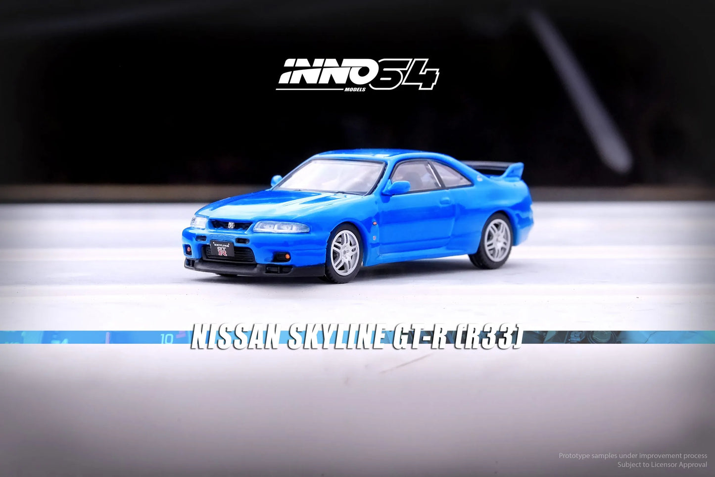 Nissan Skyline GT-R R33 Championship Blue 1:64 diecast model front three-quarter view