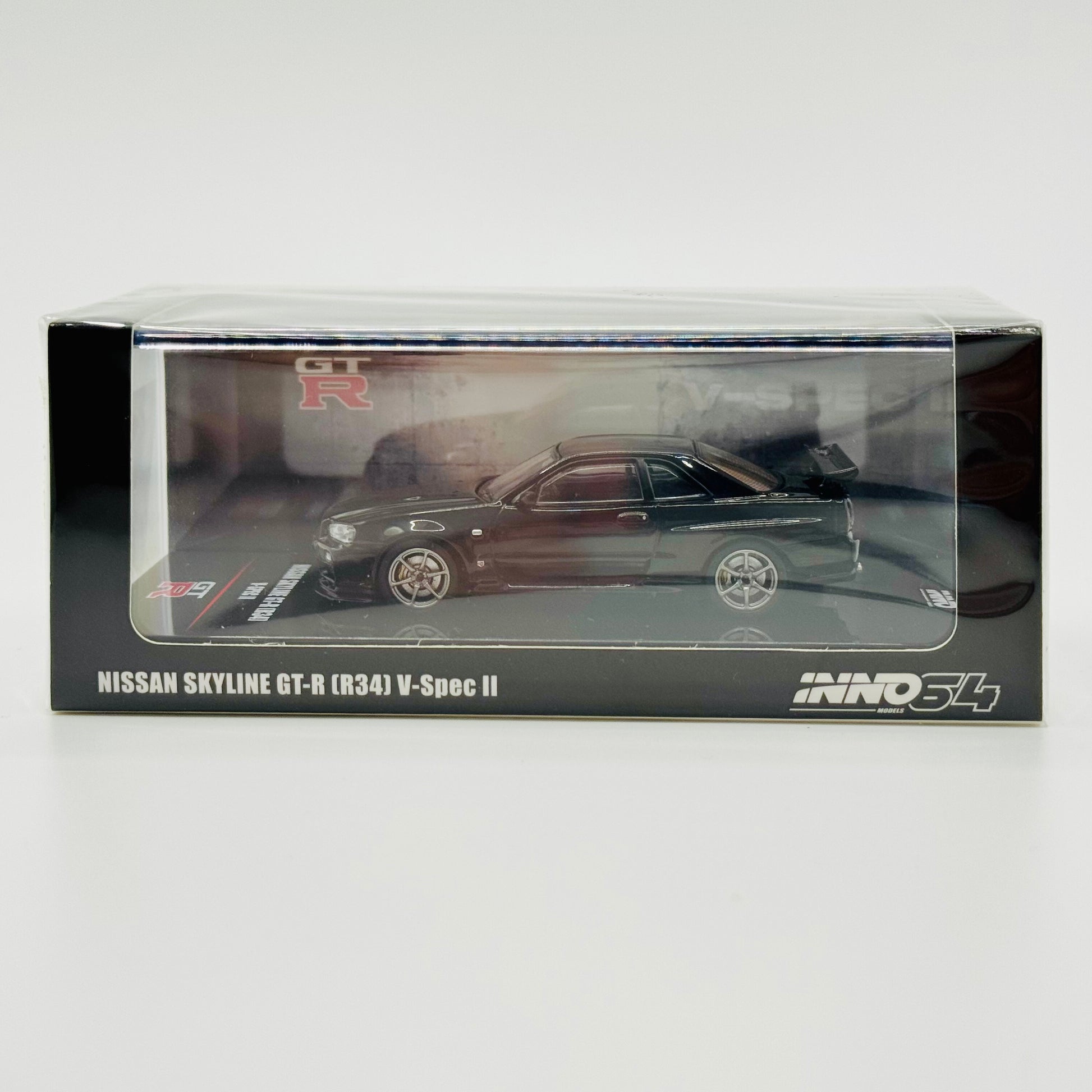 Inno64 Nissan Skyline GT-R R34 V-Spec II Black 1:64 diecast model box front view