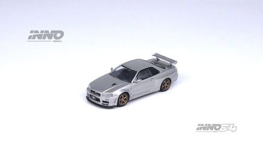 Nissan Skyline GT-R R34 V-Spec II Silver 1:64 diecast model front three-quarter view