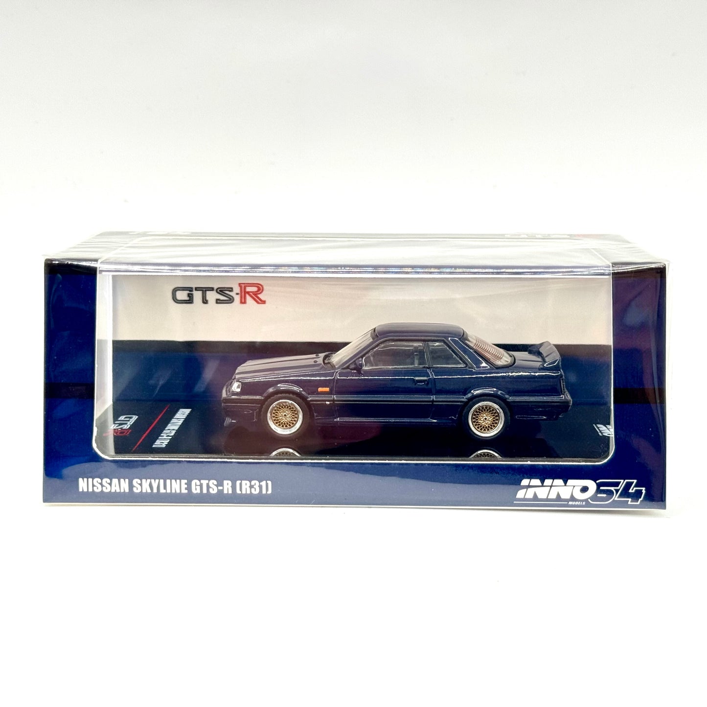 Inno64 Nissan Skyline GTS-R R31 Dark Blue box front view 1:64 diecast model car