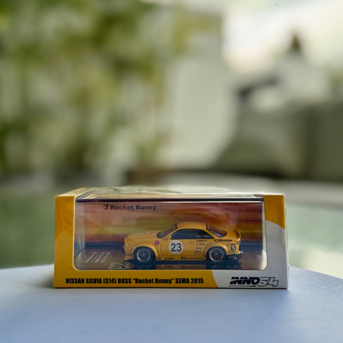 Panorama view of INNO64 Nissan Silvia S14 BOSS Red Bull livery #15 diecast model