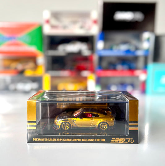 Front view of INNO64 Nissan GT-R R35 Top Secret Gold Kuala Lumpur Expo 2024 model car
