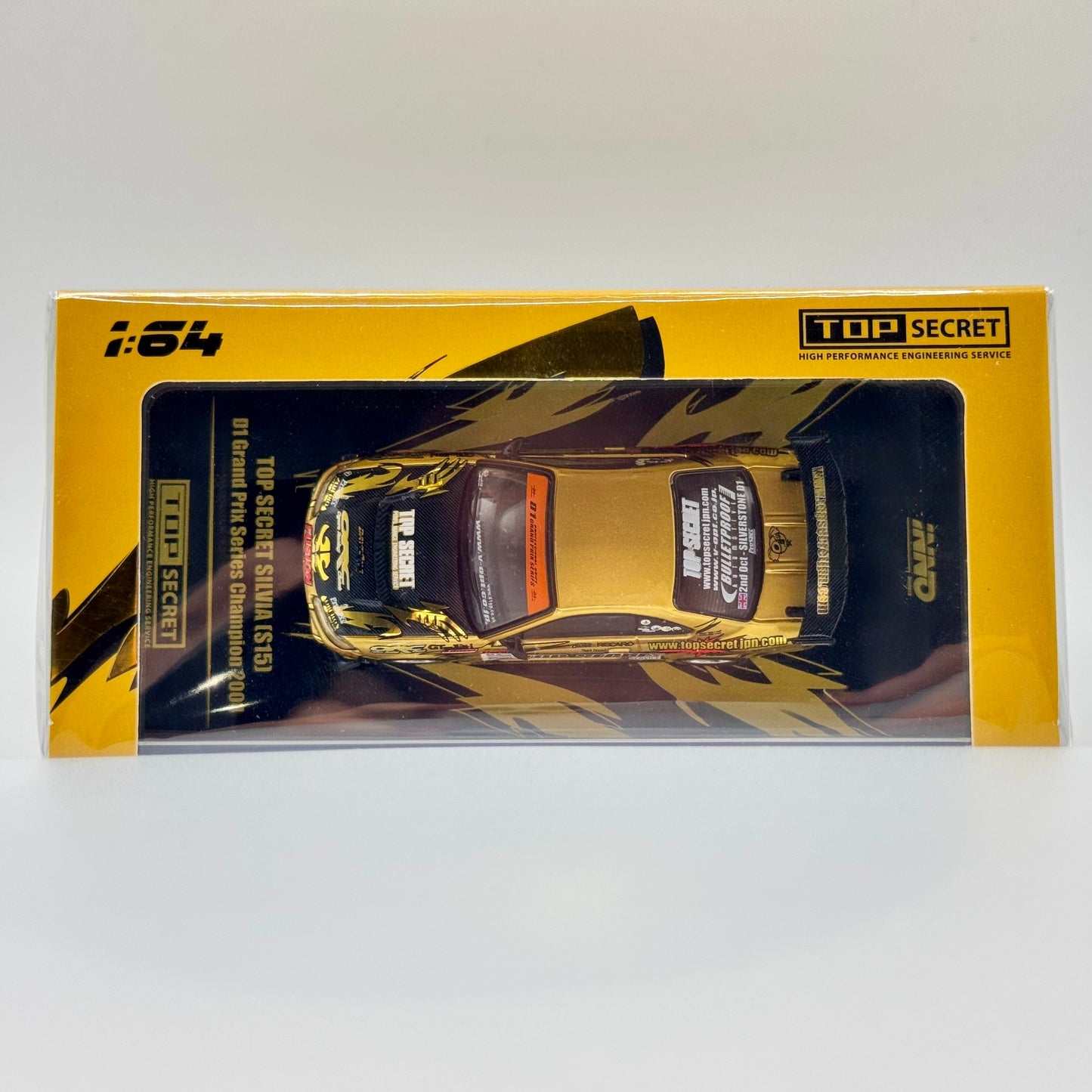 Inno64 TOP SECRET Nissan Silvia S15 Gold D1 Grand Prix 2004 1:64 model in acrylic case top angle