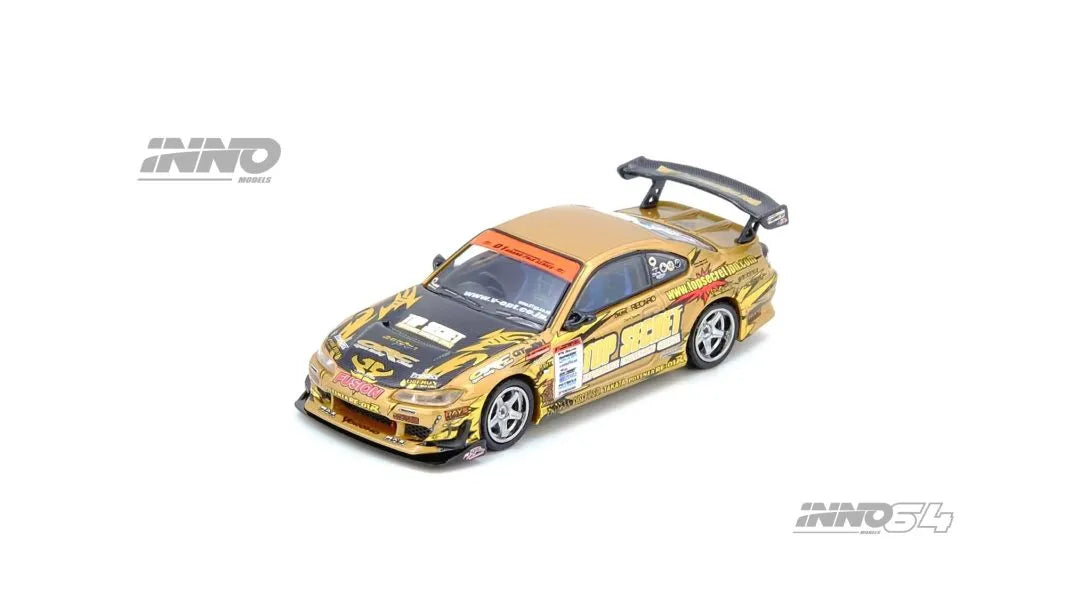Inno64 TOP SECRET Nissan Silvia S15 Gold D1 Grand Prix 2004 1:64 diecast model front three-quarter view