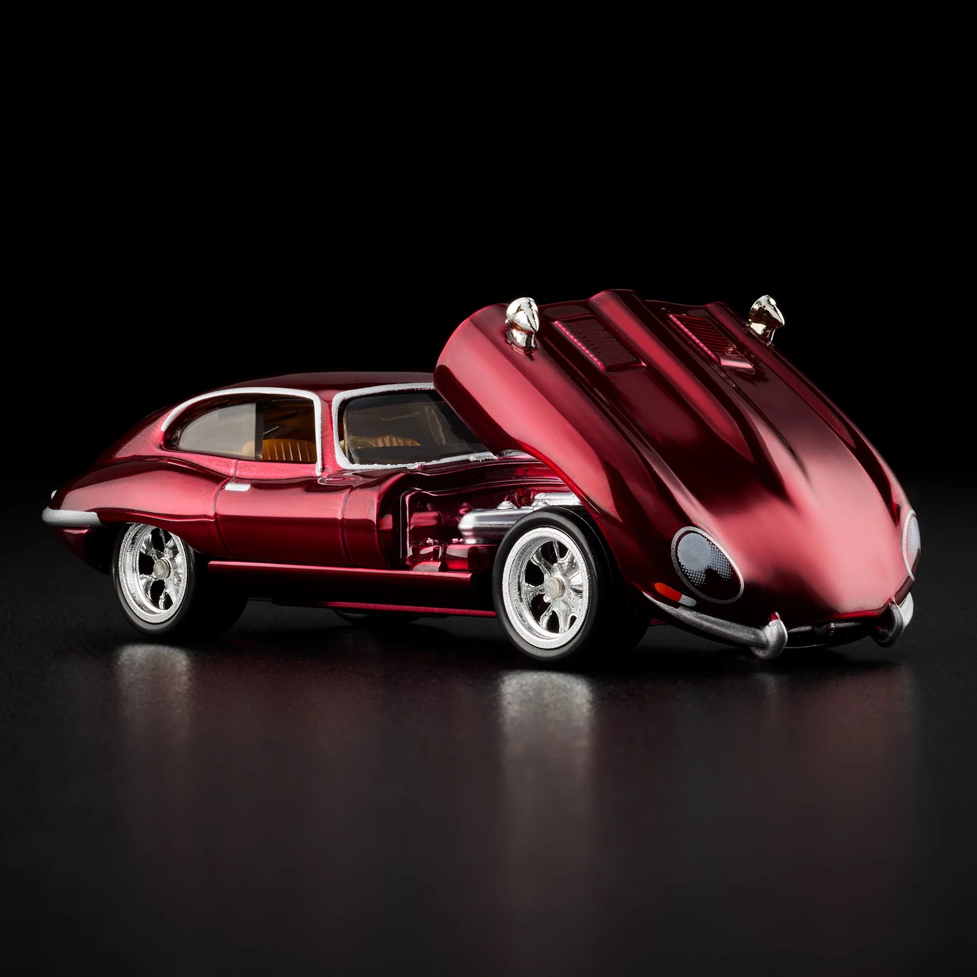 Front angle view of unboxed Hot Wheels RLC 1964 Jaguar E-Type diecast model with open hood