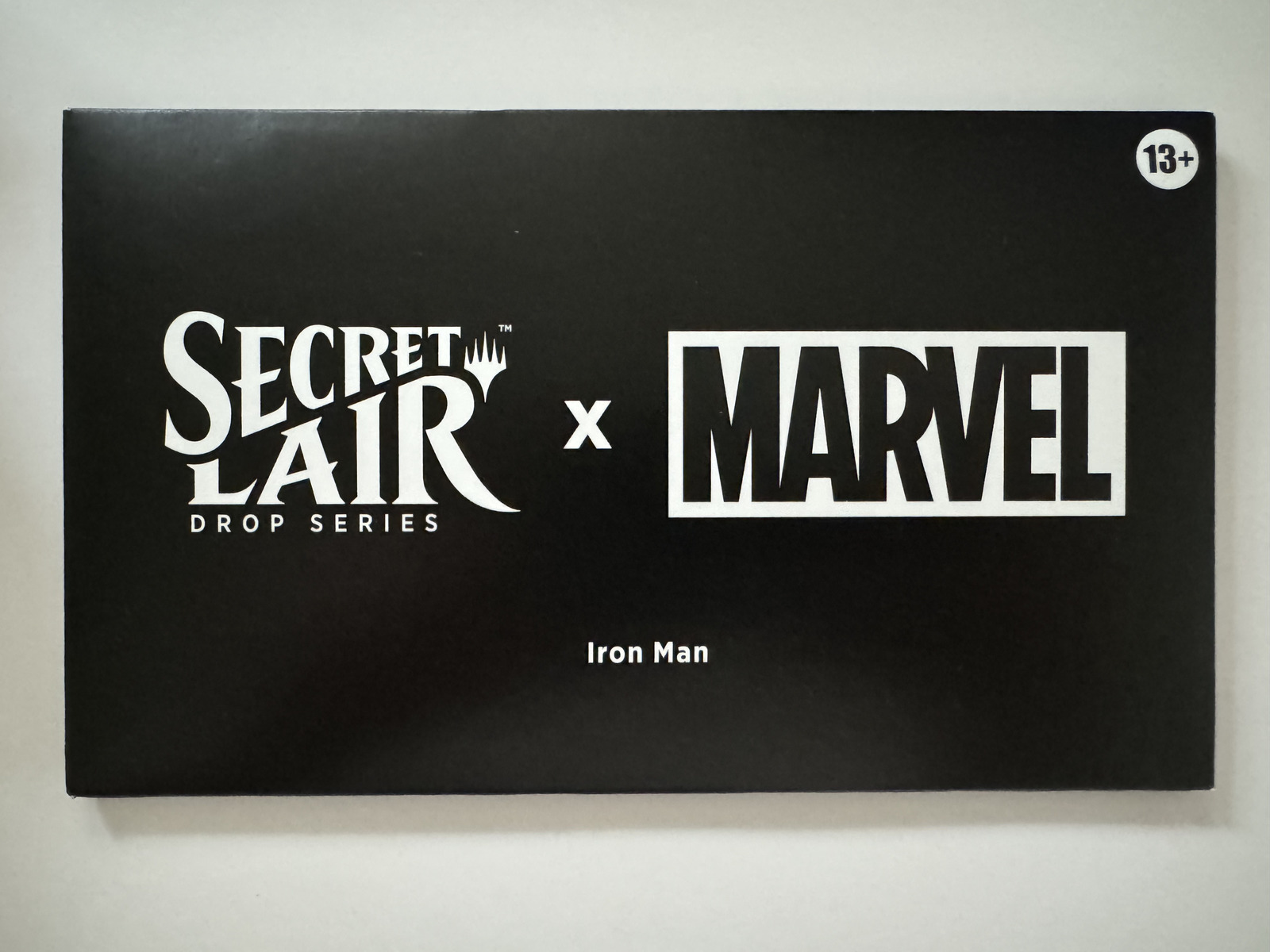 Magic: The Gathering Marvel Secret Lair 2024 Iron Man card, non-foil edition, featuring detailed Marvel-themed artwork and card design.
