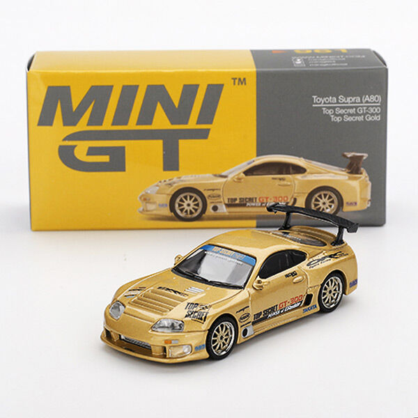 Mini GT MGT00961 Toyota Supra A80 Top Secret GT-300 Gold 1:64 diecast box front
and unboxed