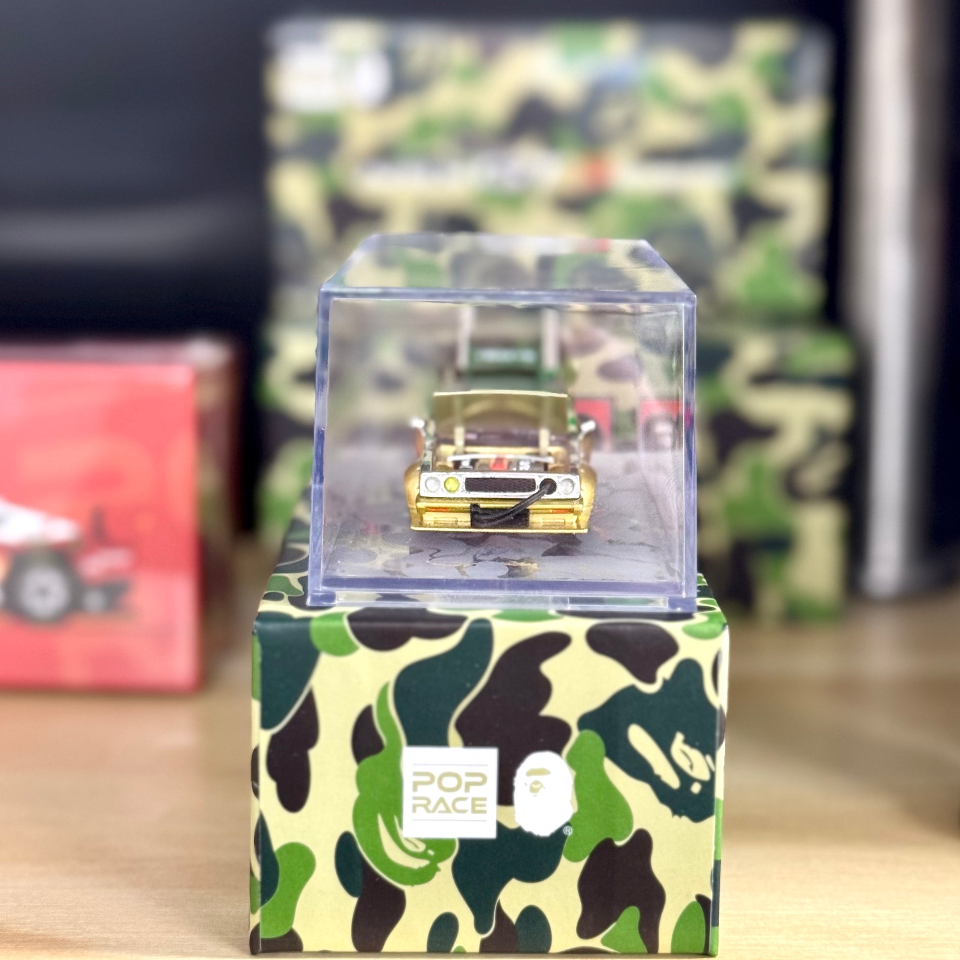 Low front angle showing details of BAPE Kaido Racer Nissan in display case