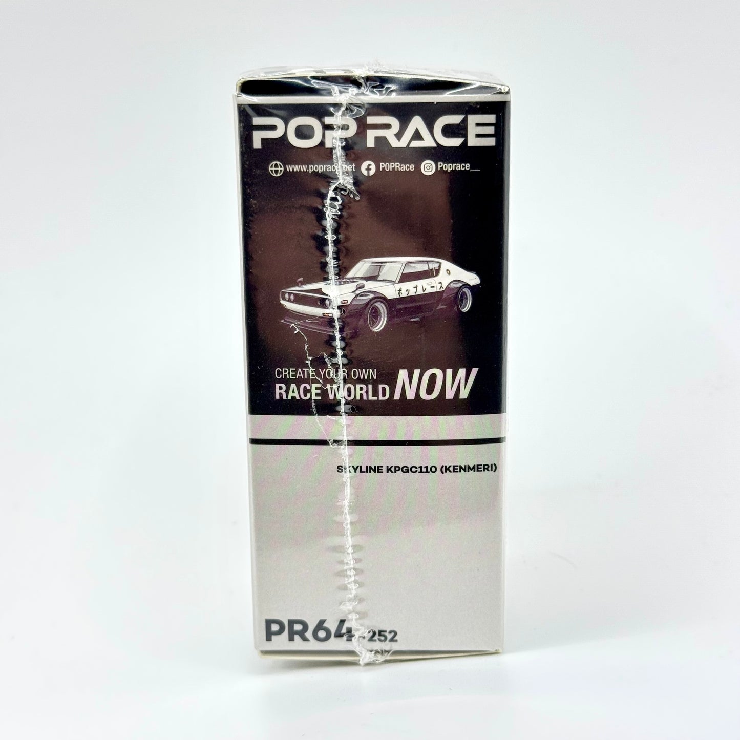 Nissan Skyline KPGC110 Kenmeri Pop Race packaging angled view