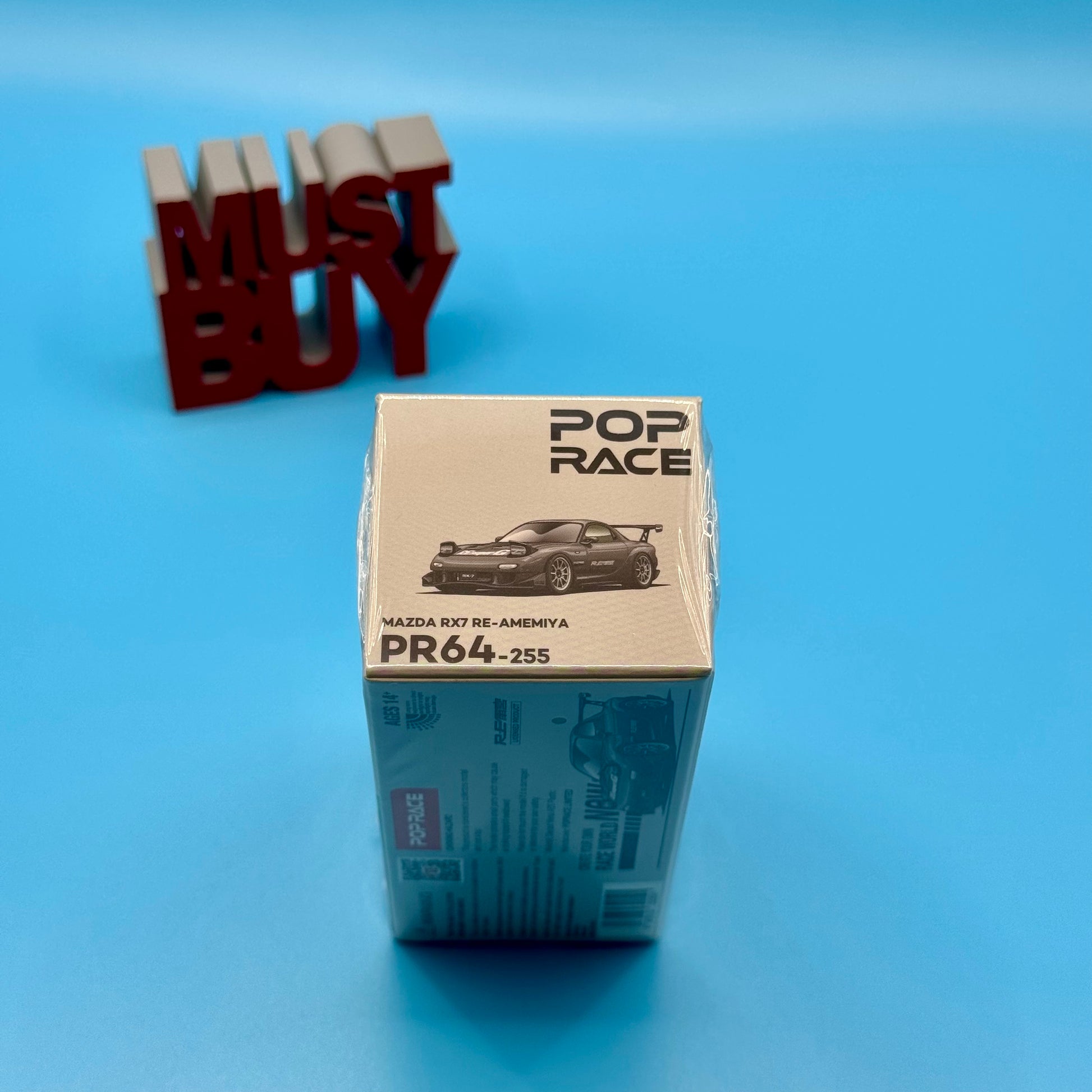 Top view of boxed 1:64 Pop Race RX-7 RE-AMEMIYA Widebody