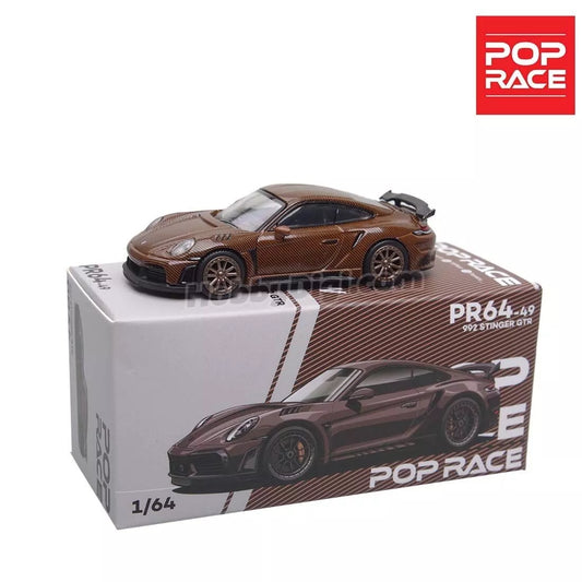 Porsche 992 Stinger GTR Carbon Edition Brown 1:64 model in box, front view