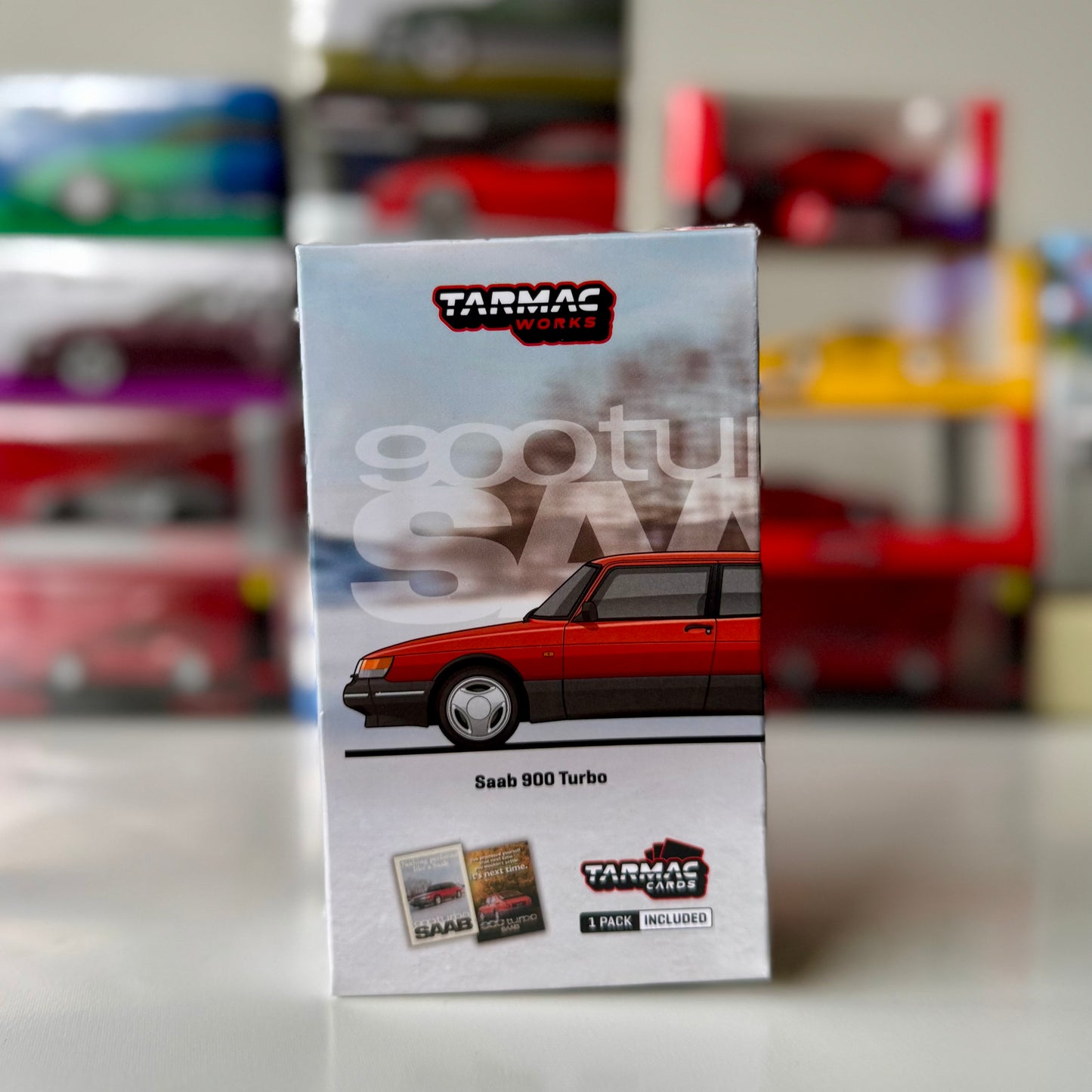 Saab 900 Turbo Red diecast model in original Tarmac Works Hobby64 box – front view