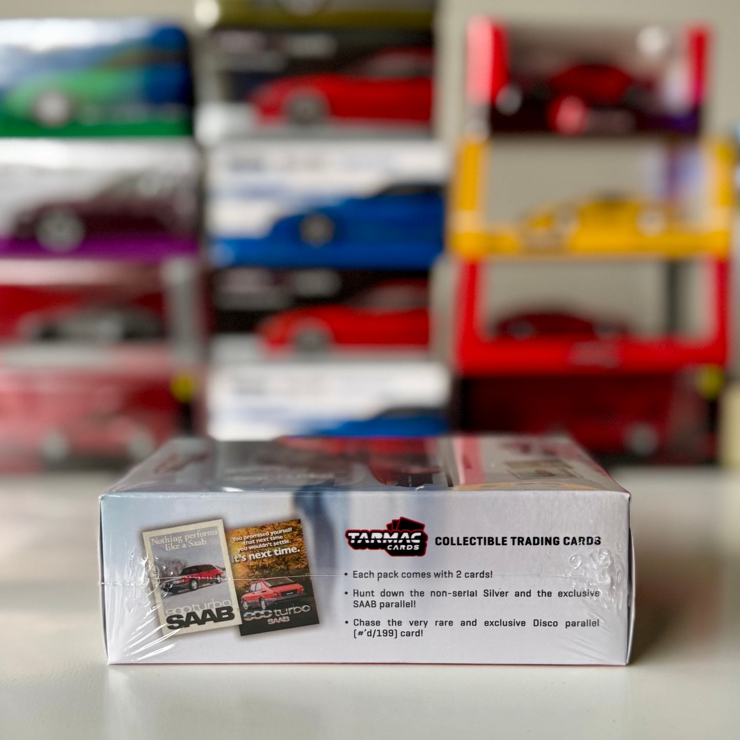 Side boxed view of Saab 900 Turbo Red 1:64 scale diecast model