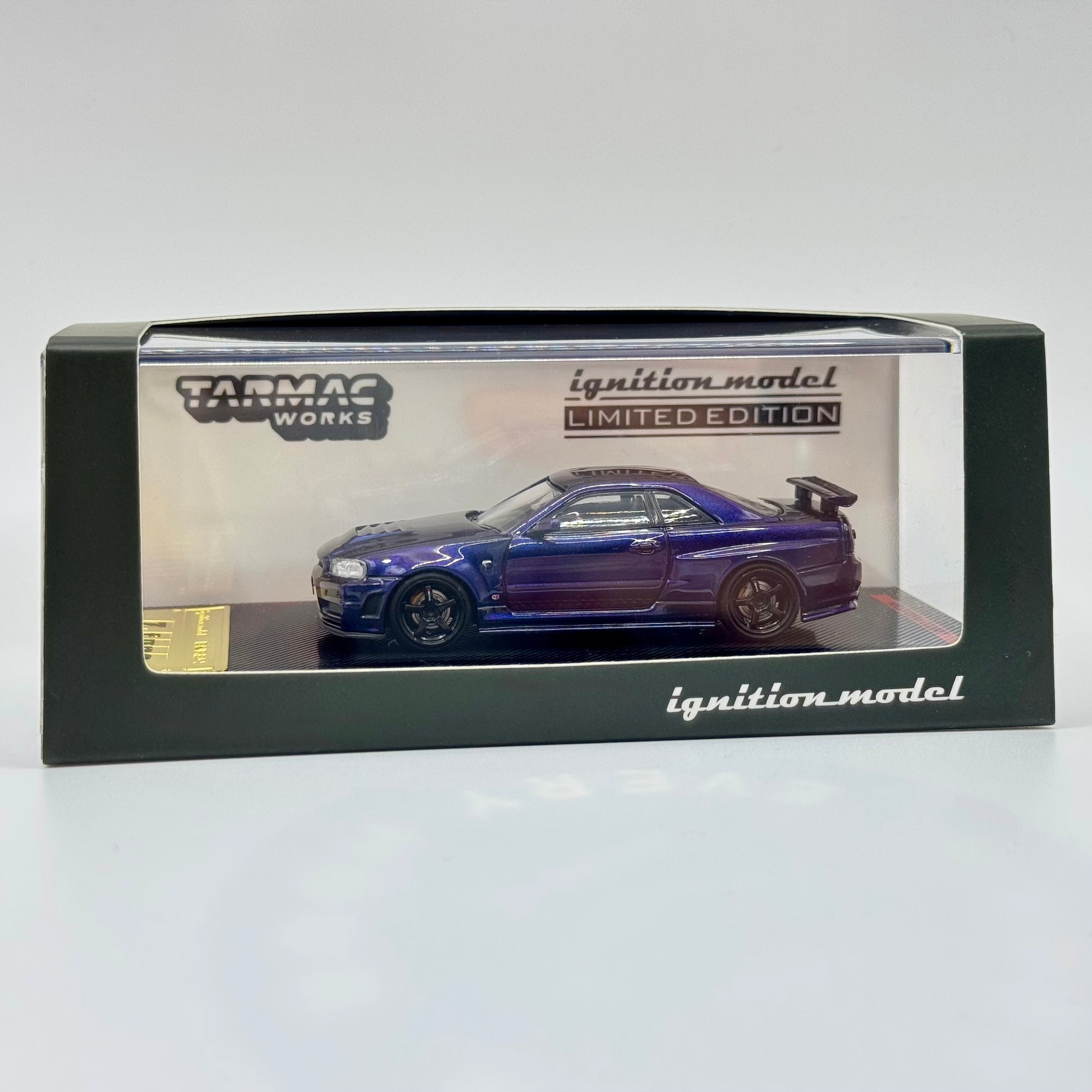 Tarmac Works Ignition Model Nismo R34 GT-R Z-Tune 1:64 diecast model boxed front view