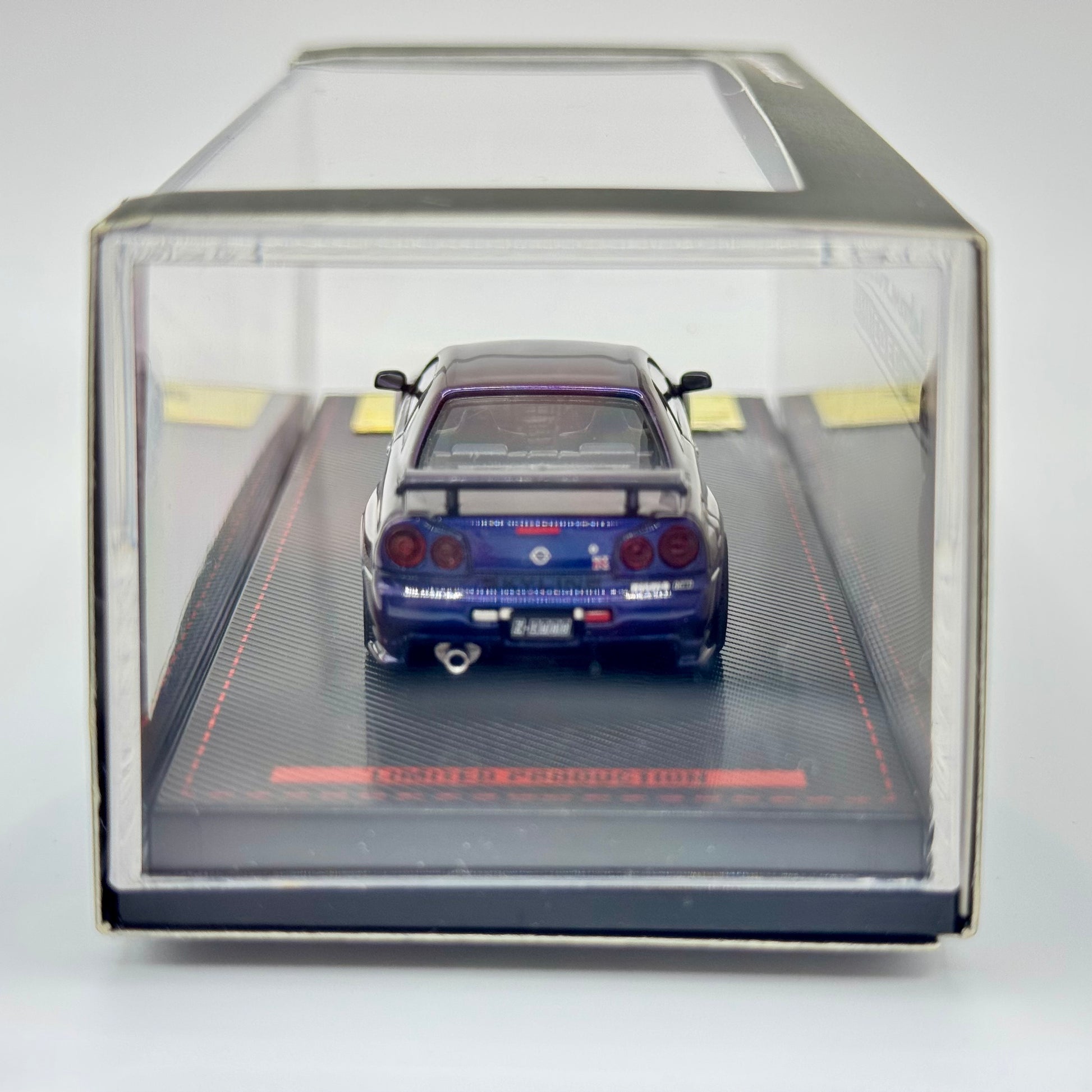 Tarmac Works Ignition Model Nismo R34 GT-R Z-Tune 1:64 diecast model boxed rear view