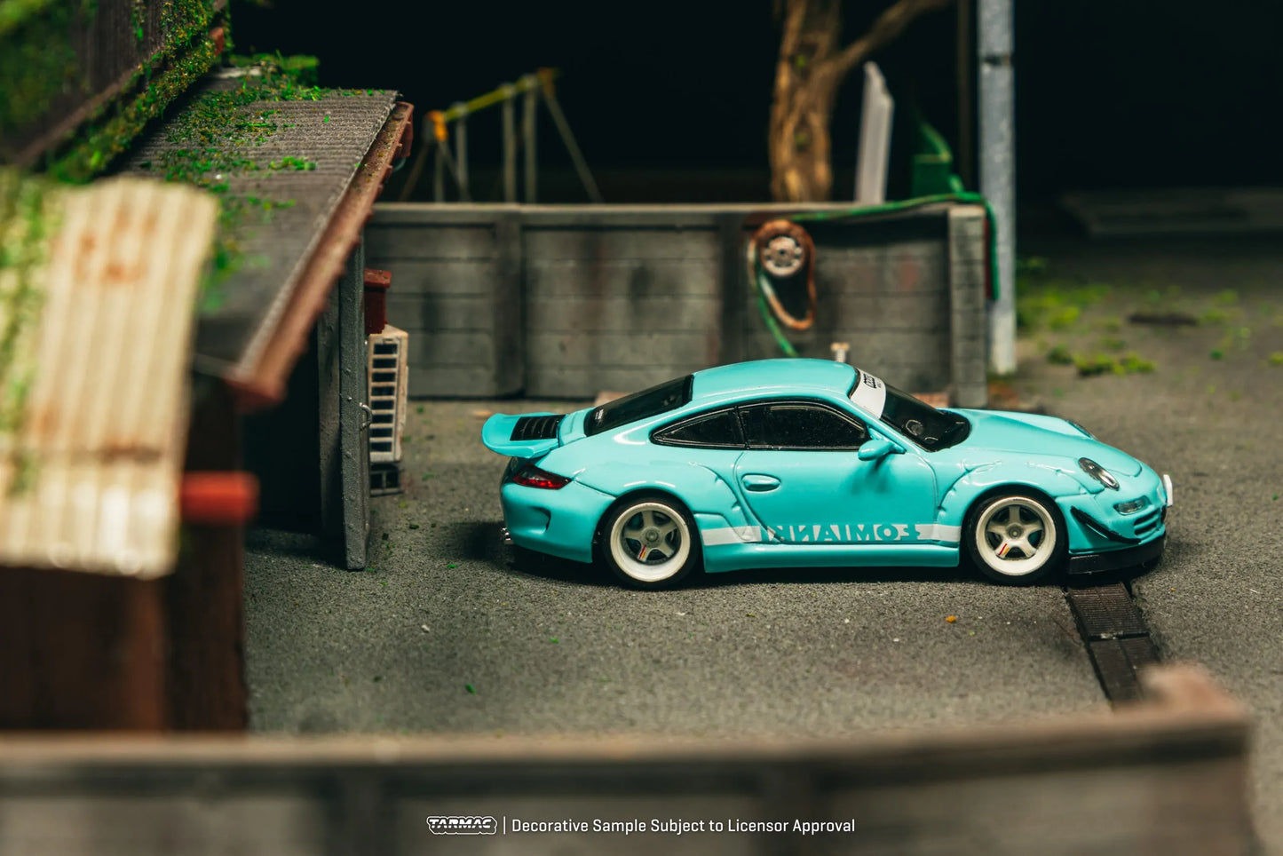 Porsche RWB 997 Lomianki 1:64 diecast displayed in garage diorama