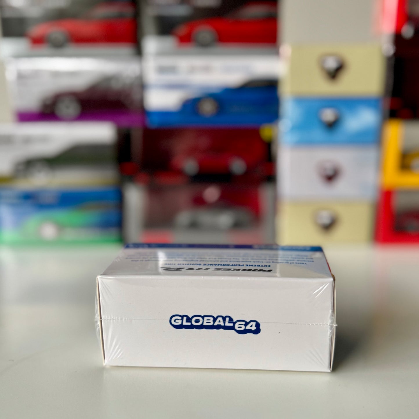 Global64 packaging of Tarmac Works Silvia S13 Vertex Blue Metallic