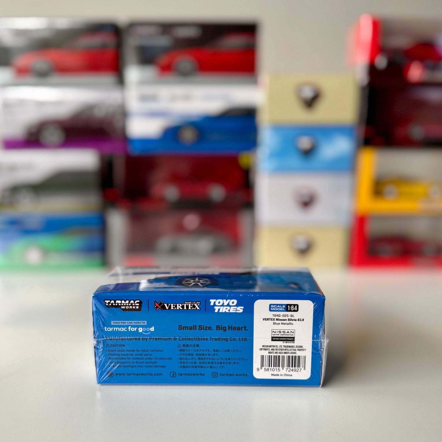 Global64 packaging of Tarmac Works Silvia S13 Vertex Blue Metallic