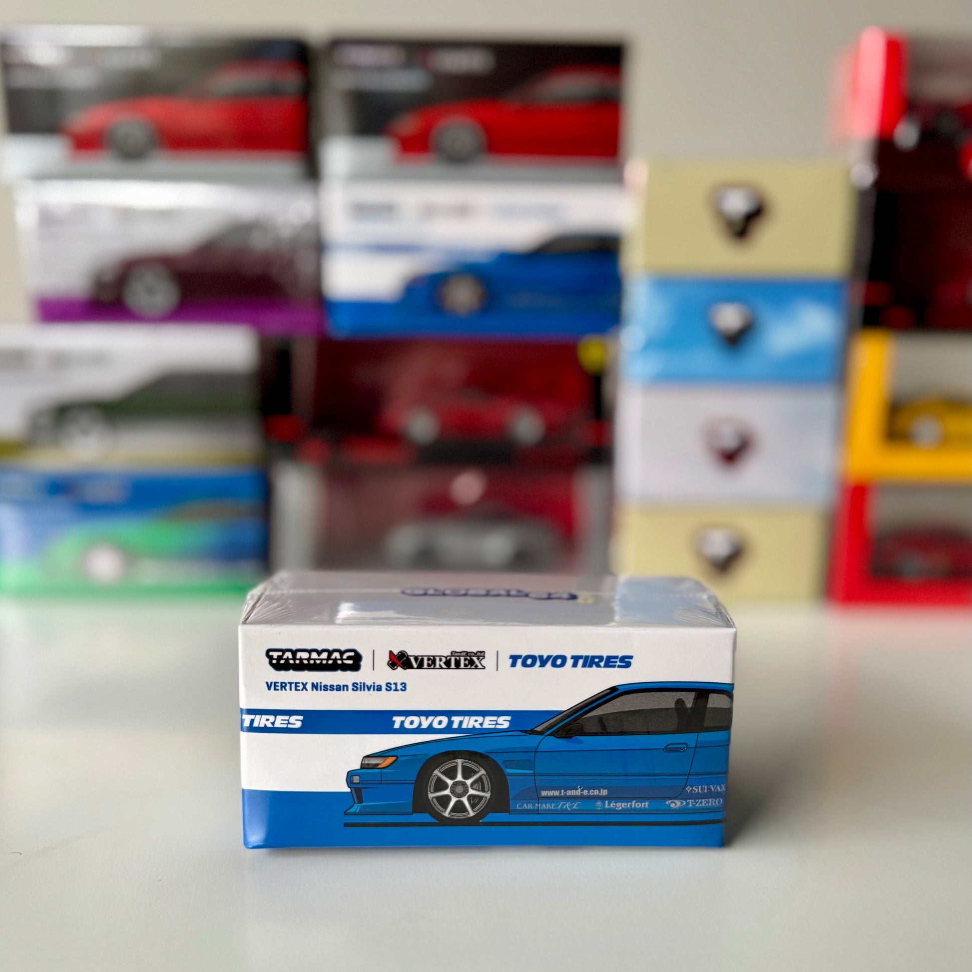 Global64 packaging of Tarmac Works Silvia S13 Vertex Blue Metallic