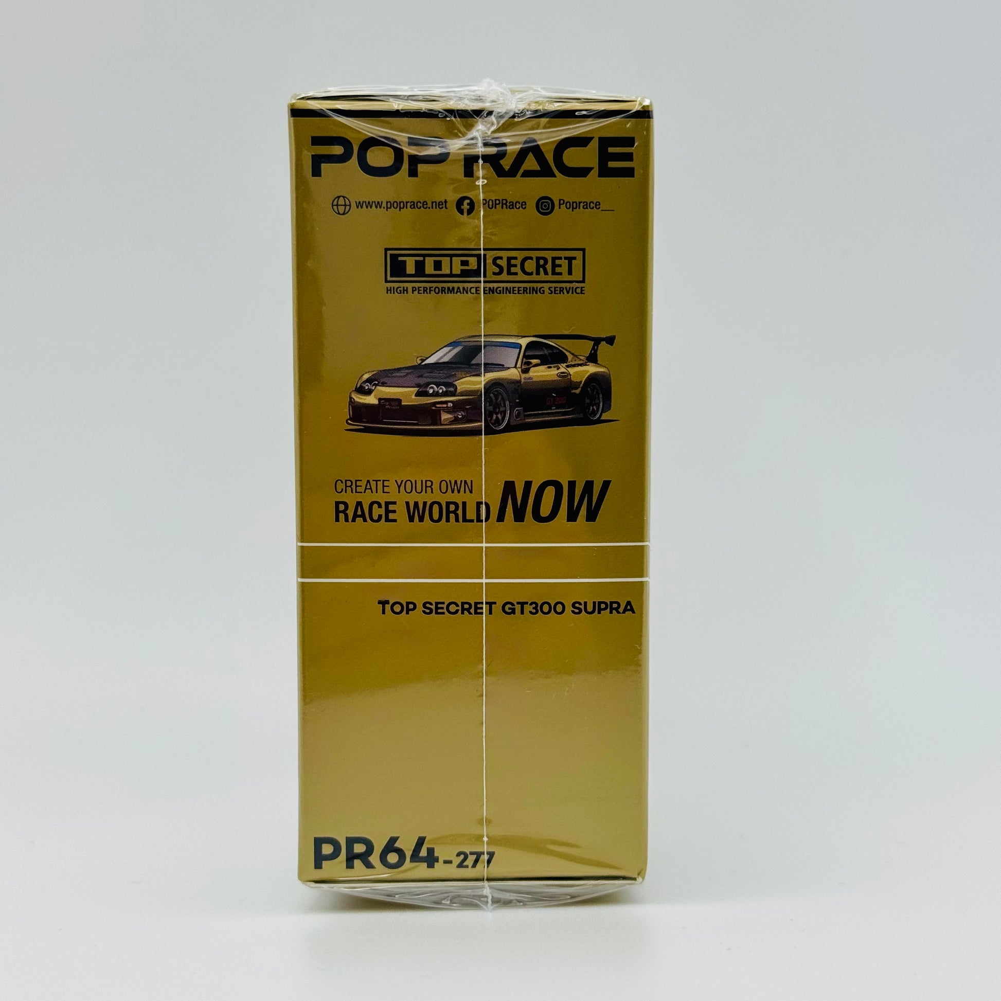 Angled view of boxed Top Secret Toyota Supra GT300 Pop Race diecast car